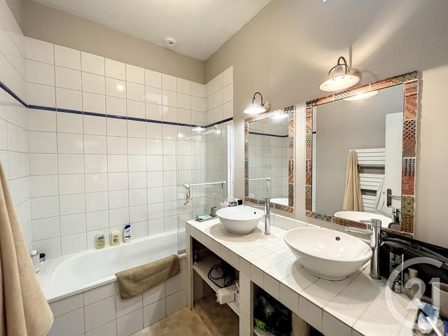 Afficher la photo en grand Appartement à vendre - 5 pièces - 110.0 m2 - TROYES - 10 - CHAMPAGNE-ARDENNE - Century 21 Martinot Immobilier