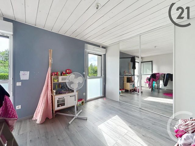Afficher la photo en grand Appartement F5 à vendre - 4 pièces - 84.0 m2 - BUCHERES - 10 - CHAMPAGNE-ARDENNE - Century 21 Martinot Immobilier