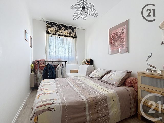 Afficher la photo en grand Appartement T4 à vendre - 4 pièces - 59.85 m2 - TROYES - 10 - CHAMPAGNE-ARDENNE - Century 21 Martinot Immobilier