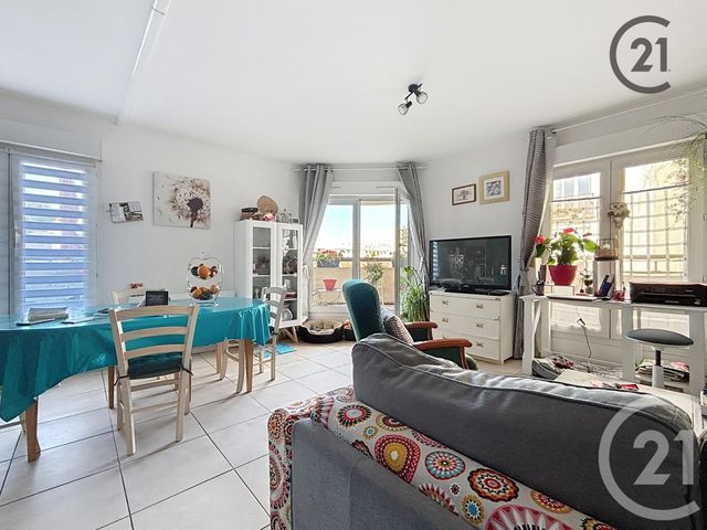 Afficher la photo en grand Appartement T4 à vendre - 4 pièces - 59.85 m2 - TROYES - 10 - CHAMPAGNE-ARDENNE - Century 21 Martinot Immobilier