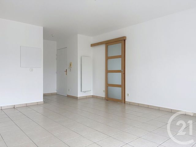 Appartement T3 à louer - 3 pièces - 63.0 m2 - ST ANDRE LES VERGERS - 10 - CHAMPAGNE-ARDENNE - Century 21 Martinot Immobilier