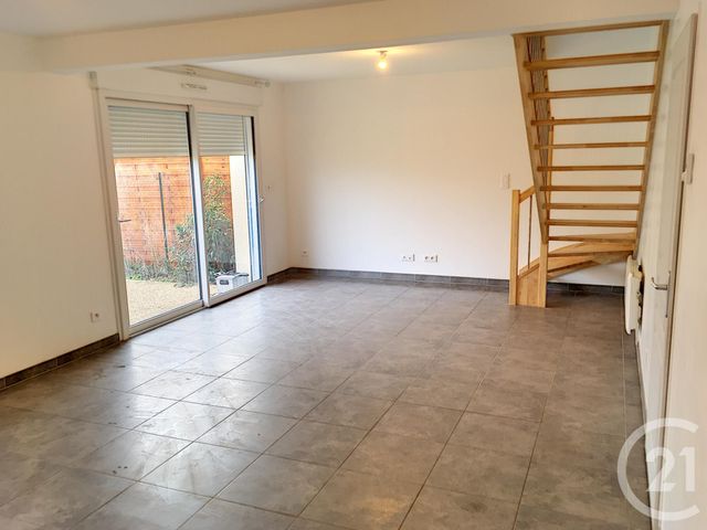 Appartement Duplex à louer - 3 pièces - 70.0 m2 - BUCHERES - 10 - CHAMPAGNE-ARDENNE - Century 21 Martinot Immobilier