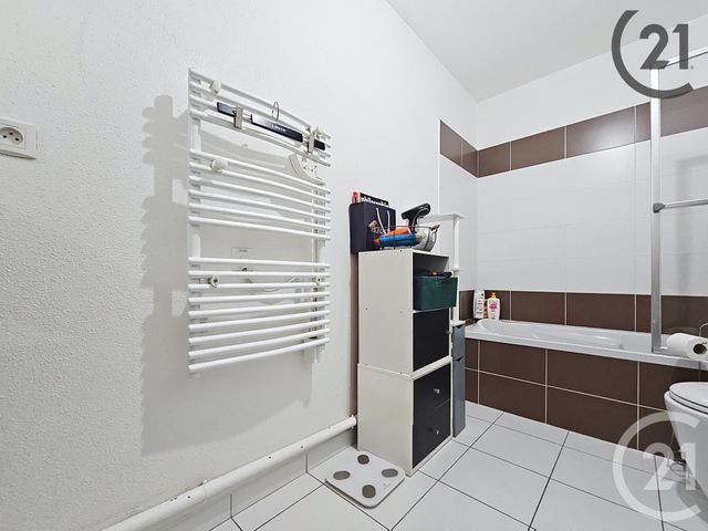 Appartement T2 à louer - 2 pièces - 38.4 m2 - STE SAVINE - 10 - CHAMPAGNE-ARDENNE - Century 21 Martinot Immobilier